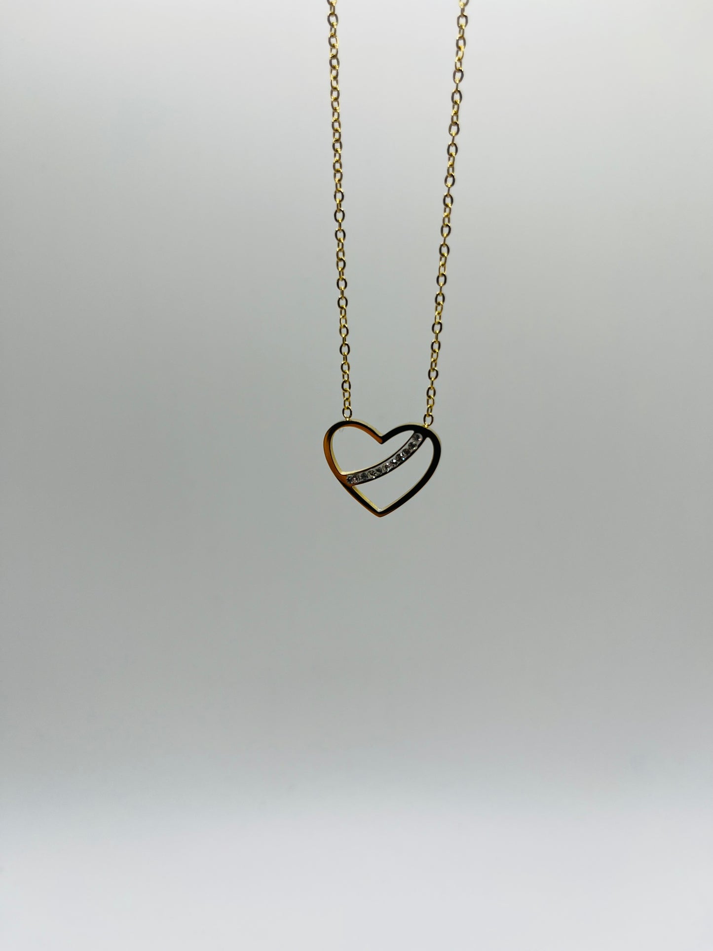 Collier acier jaune motif cœur barette en strass