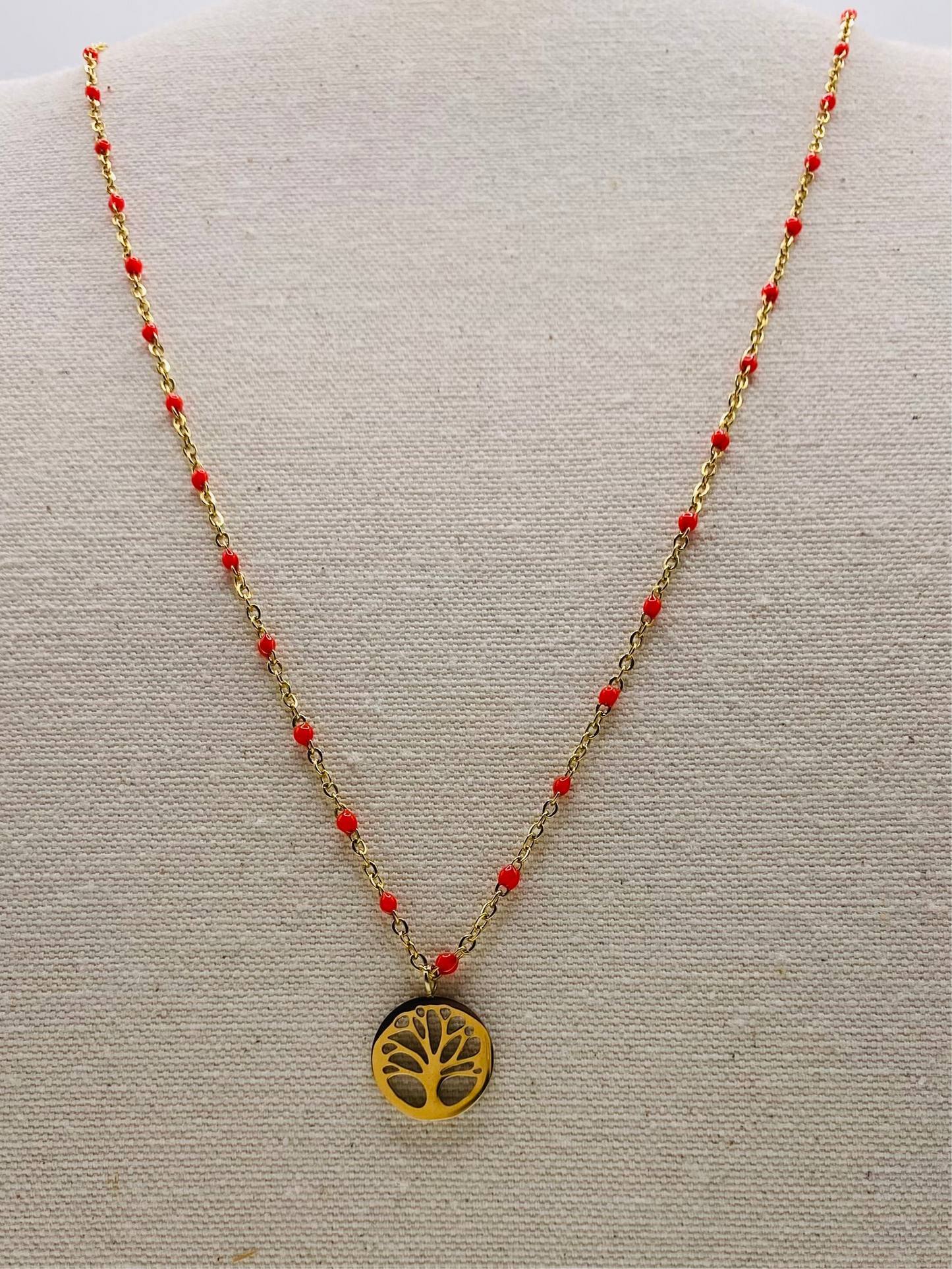 Collier acier jaune motif œil rouge chaine avec boules rouges